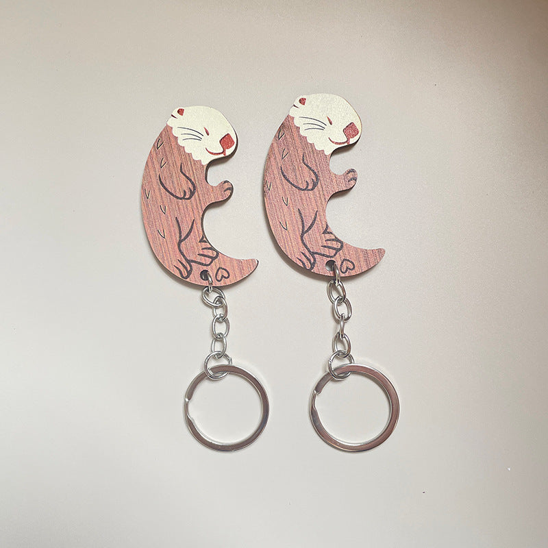 Llavero de nutria de pareja de madera de simulación creativa
