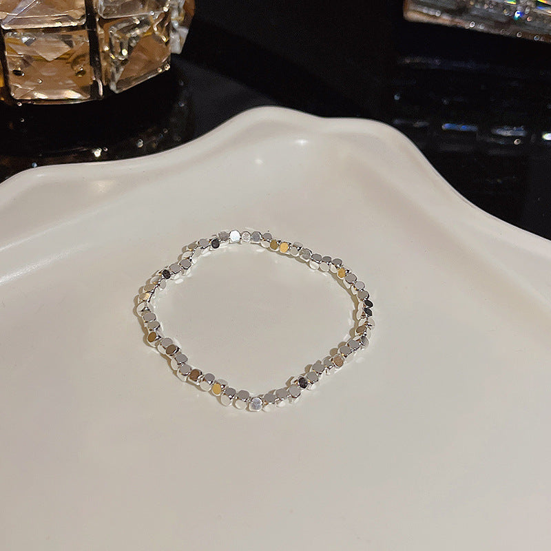 Pulsera versátil de perlas y flores de circón