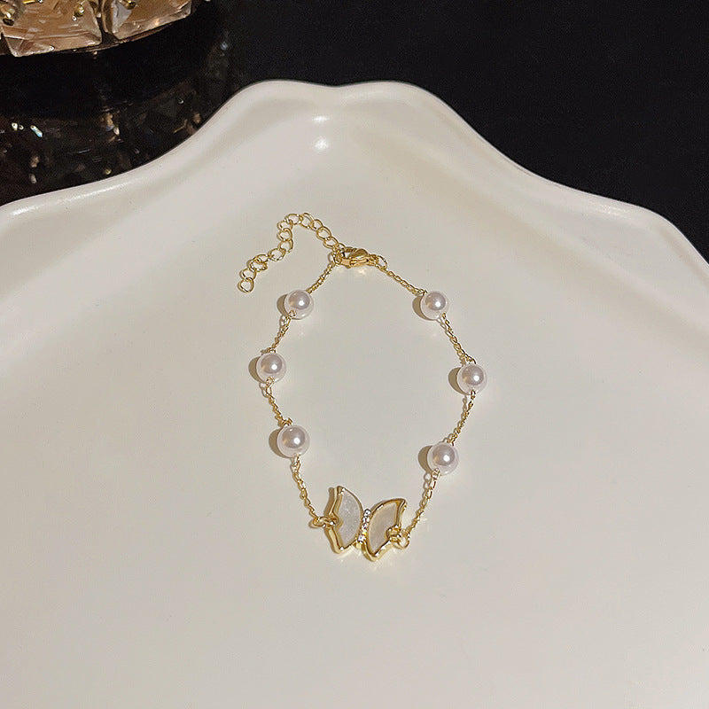 Pulsera versátil de perlas y flores de circón