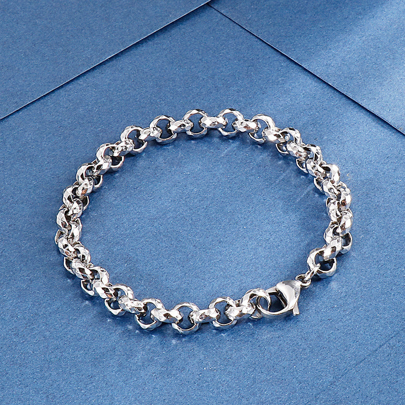 Bracelet pour homme en acier titane avec chaîne à surface multi-coupe