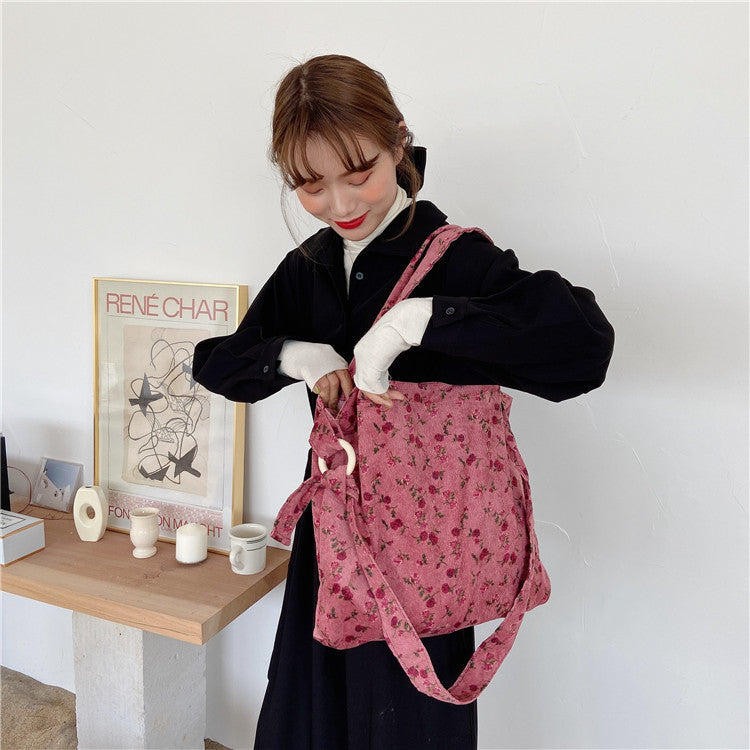 Sac messager rose rétro artistique simple de grande capacité