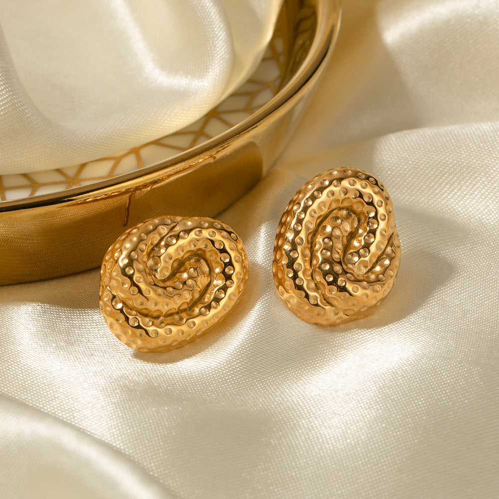 Boucles d'oreilles à motif de marteau en spirale en acier titane
