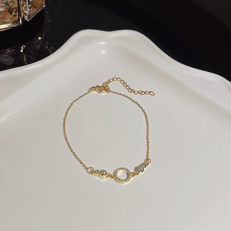 Pulsera versátil de perlas y flores de circón