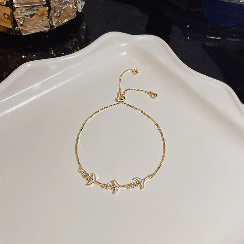 Pulsera versátil de perlas y flores de circón