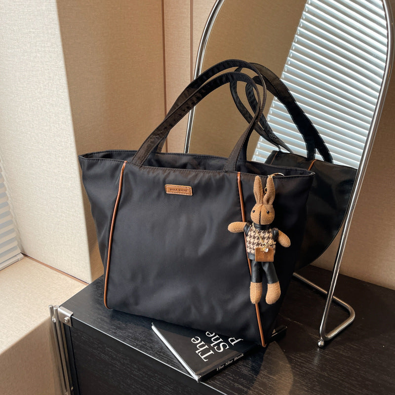 Bolso de mano de gran capacidad, bolso de hombro para ir al trabajo de estilo coreano, novedad de primavera y verano, bolso de mano de ocio que combina con todo