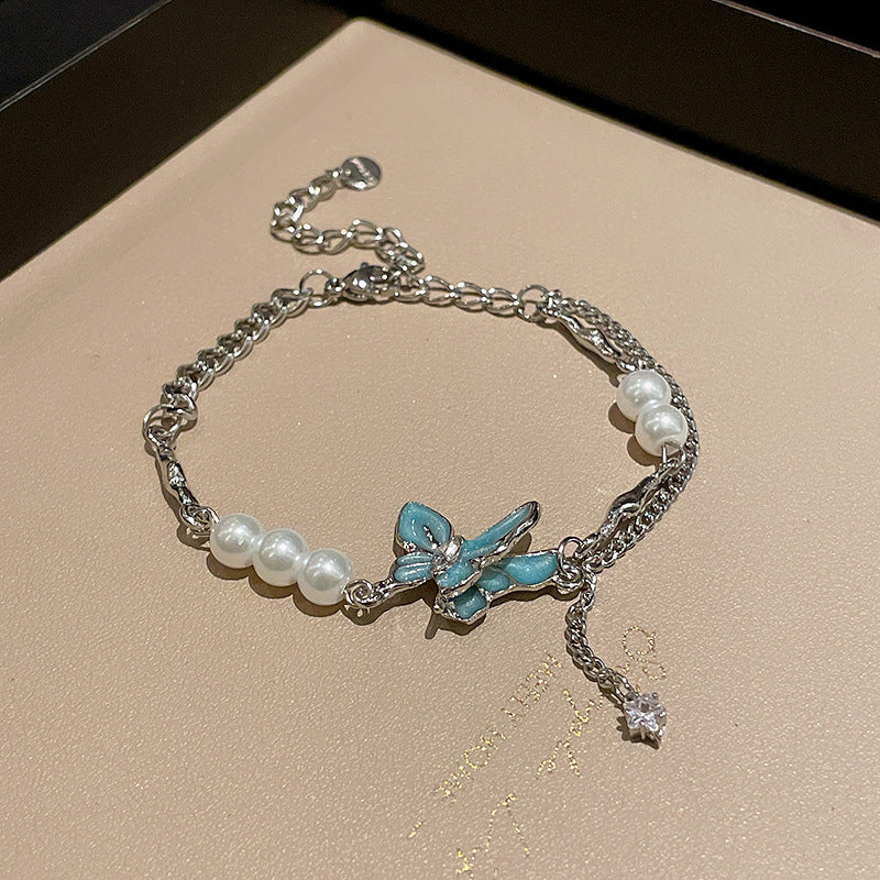 Collier de perles en strass papillon froid