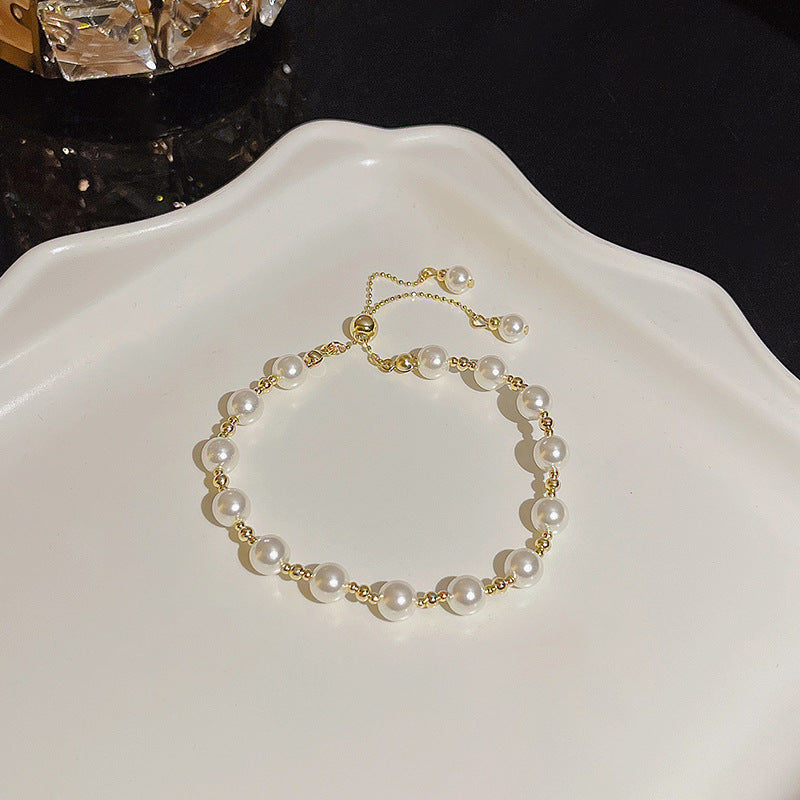 Pulsera versátil de perlas y flores de circón