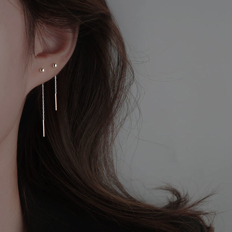 Línea de oreja larga simple para mujer de alto sentido