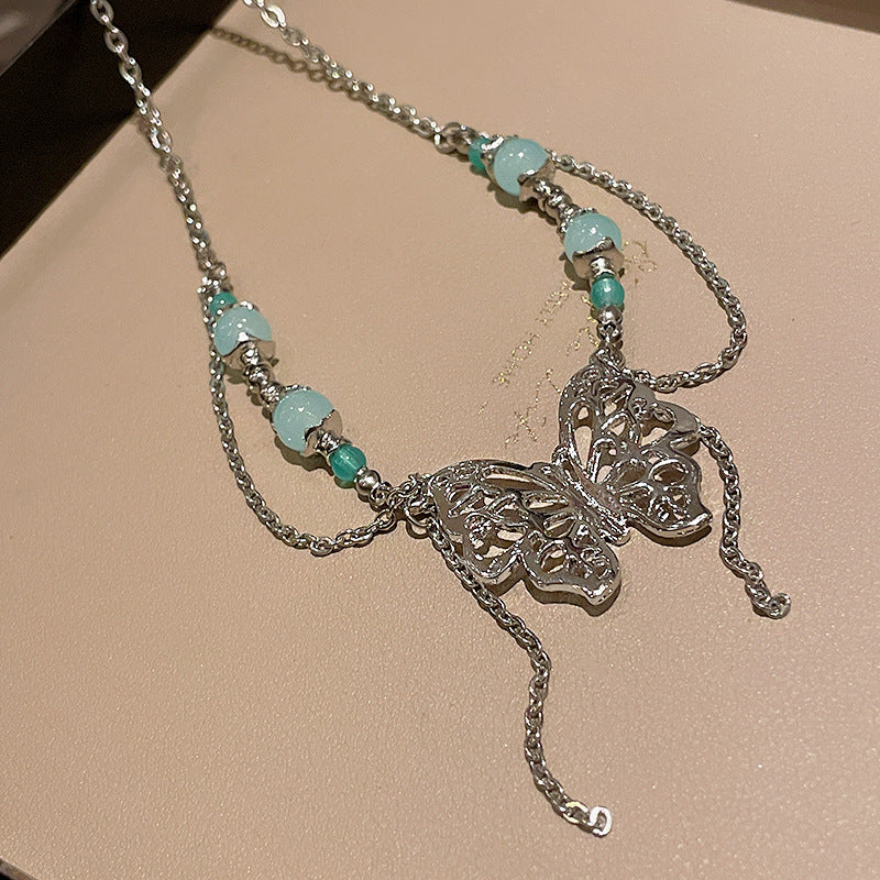 Collier de perles en strass papillon froid
