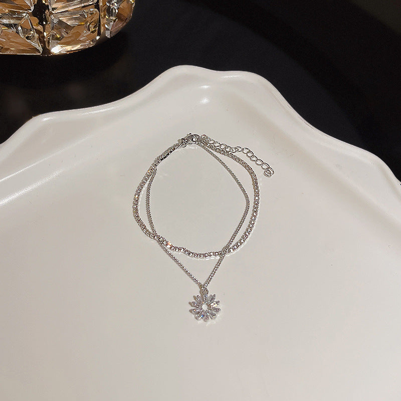 Pulsera versátil de perlas y flores de circón