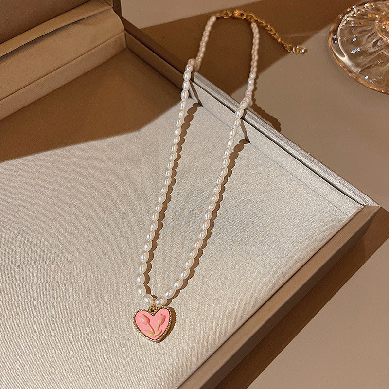 Collier de perles d'amour à coutures assorties pour femmes