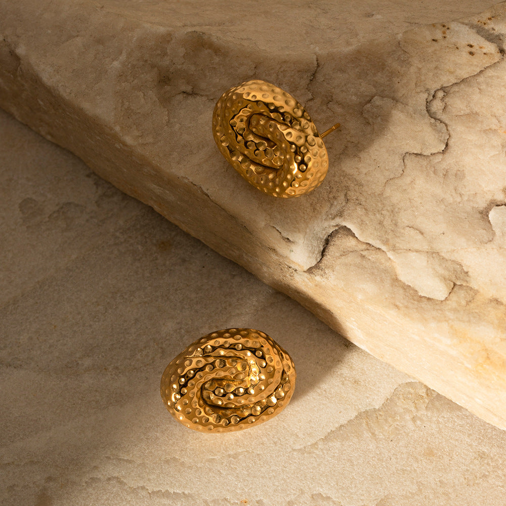 Boucles d'oreilles à motif de marteau en spirale en acier titane