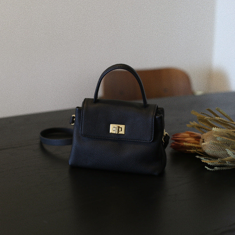 Mini sac portable en cuir de vache de première couche