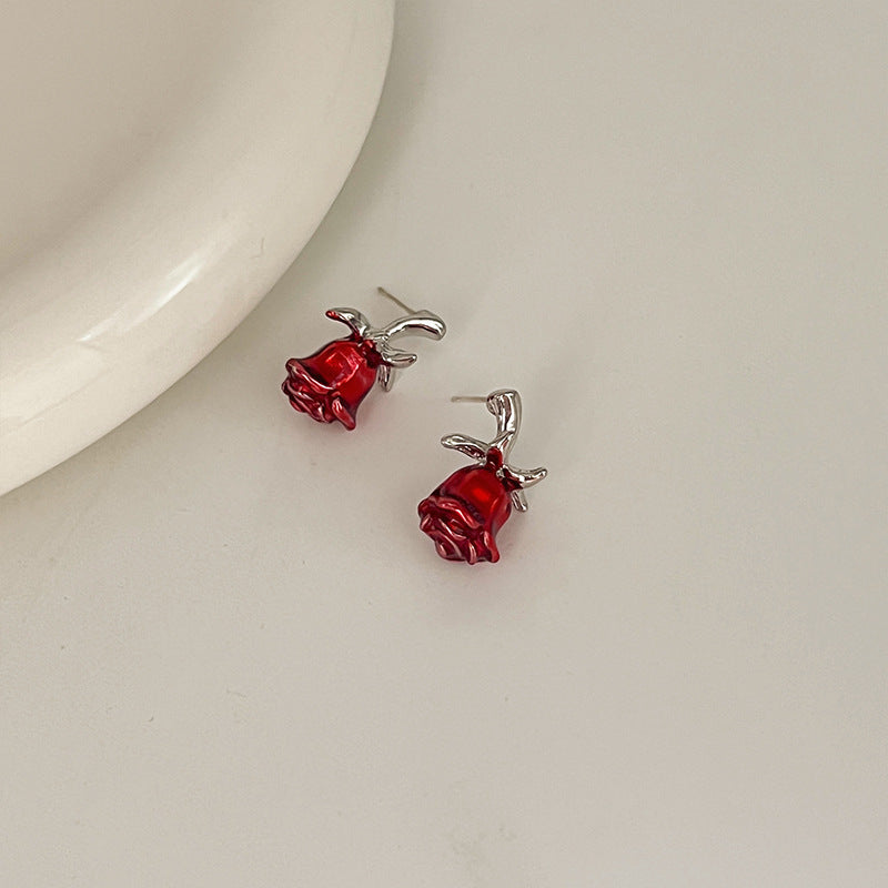 Boucles d'oreilles à tige en argent avec fleur de rose et aiguille