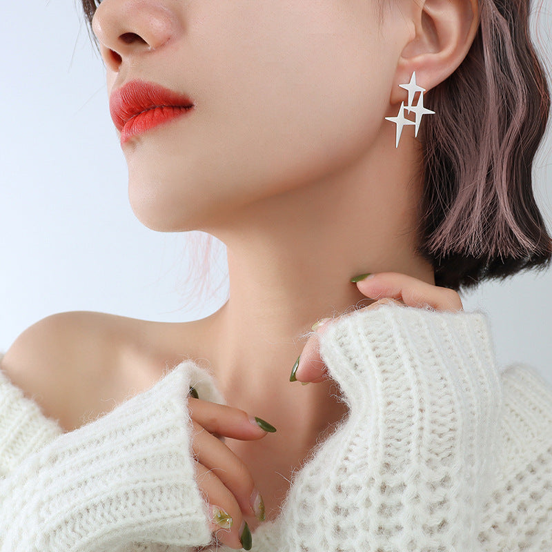 Pendientes de botón de estrella de ocho puntas con cruz exagerada de temperamento minoritario de lujo ligero