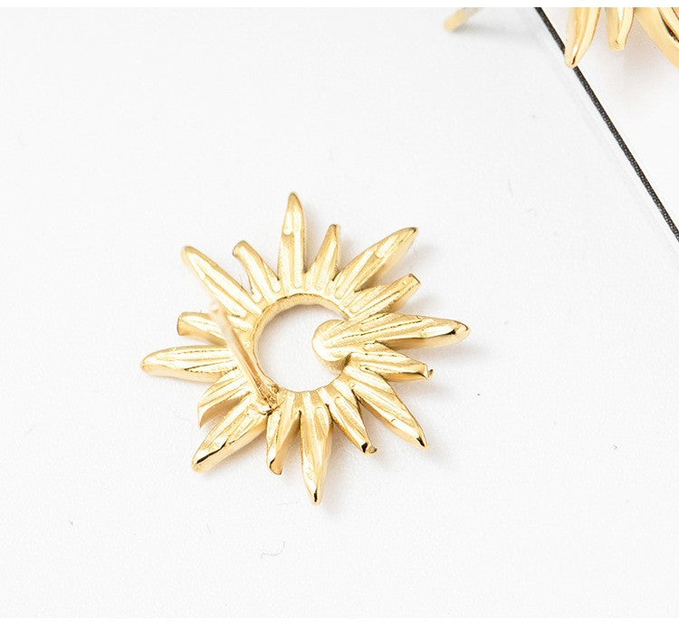 Clous d'oreilles Stereo Sun Flower en acier titane