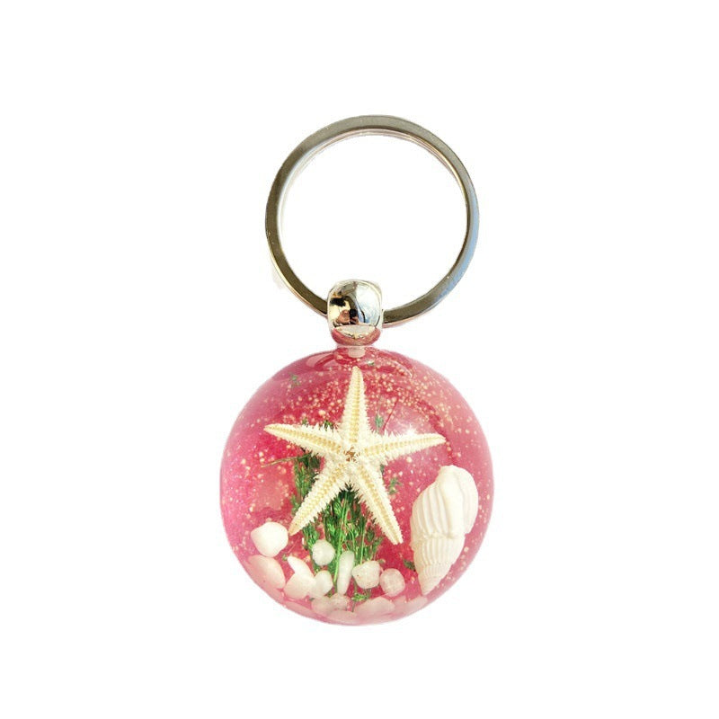 Colgante de llavero de ámbar de estrella de mar