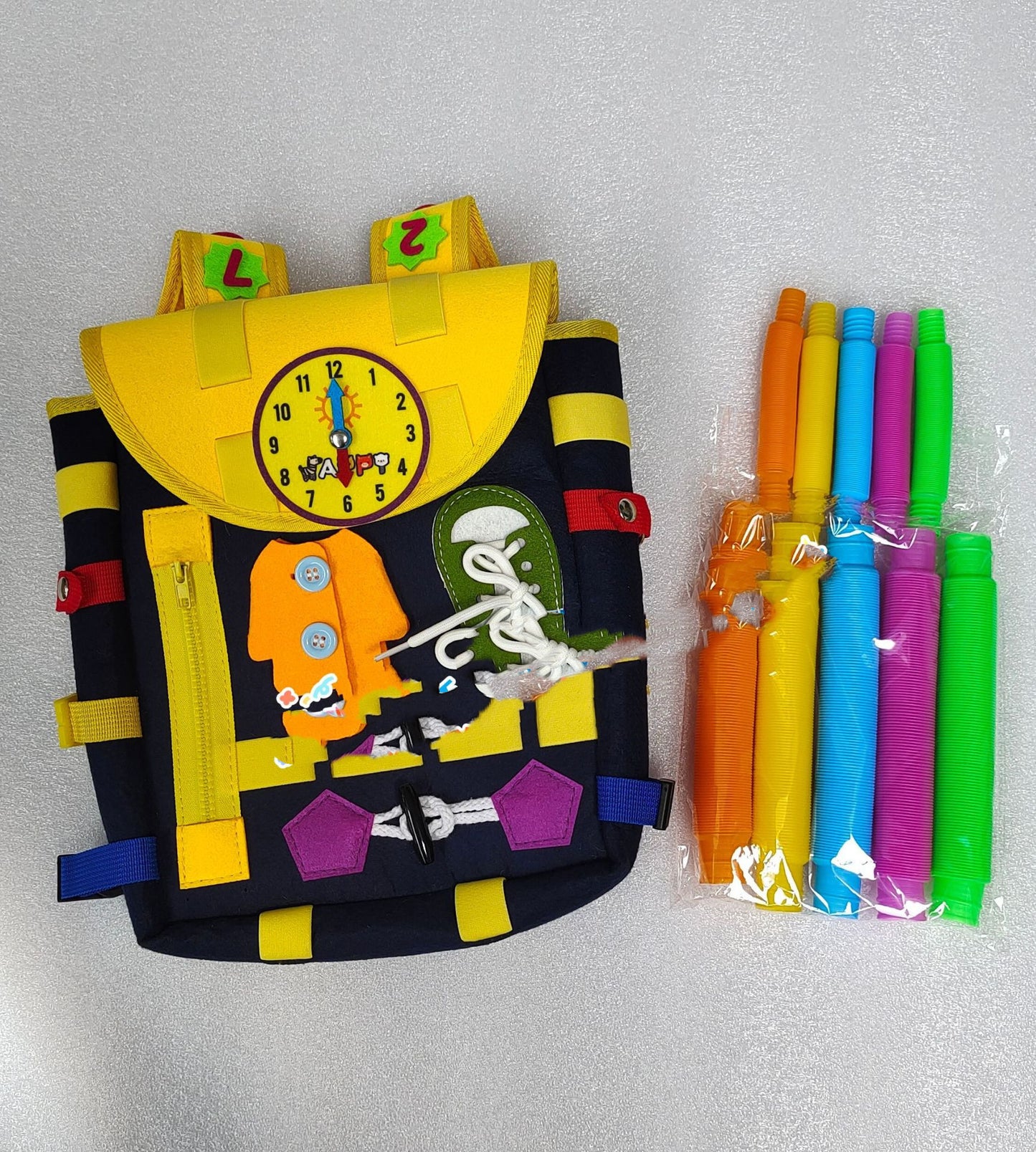 Sac à dos pour tout-petits, avec boucles et jouets d'activités d'apprentissage, développe les compétences de base