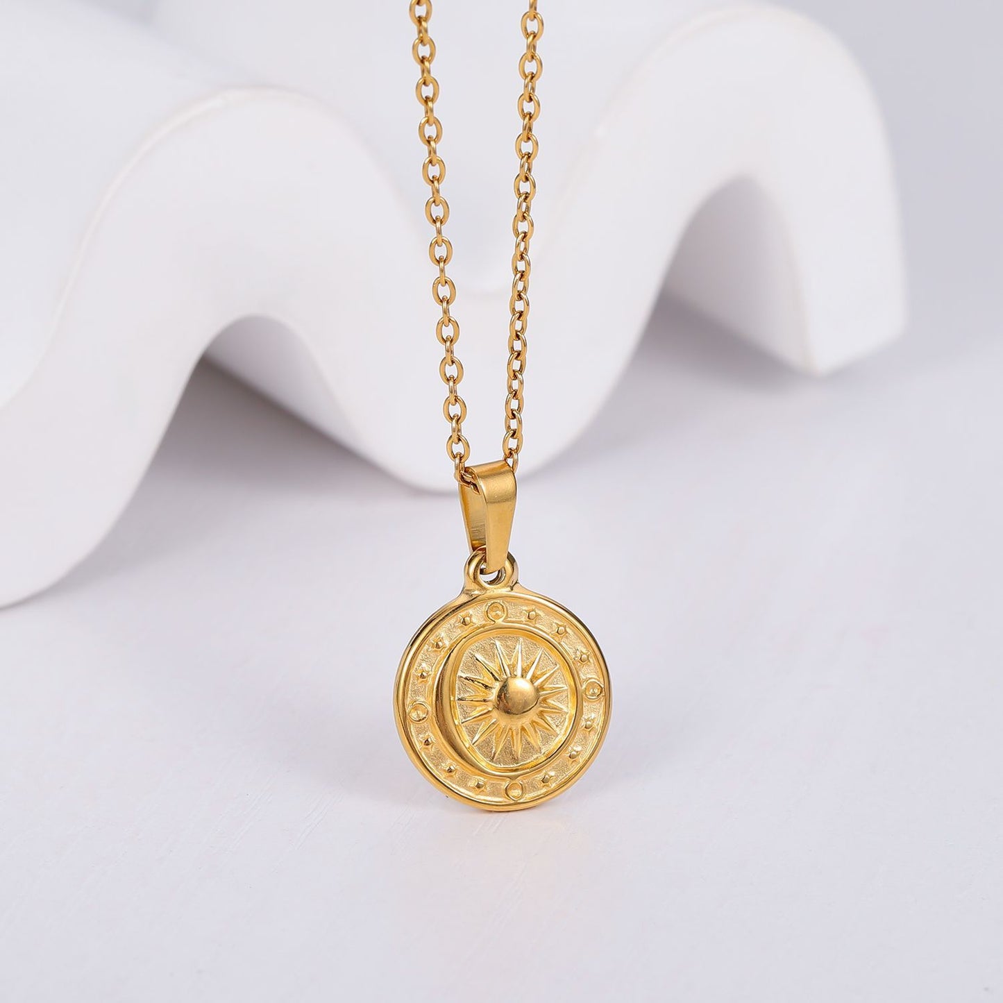 Collier pendentif boussole XINGX soleil lune en acier titane