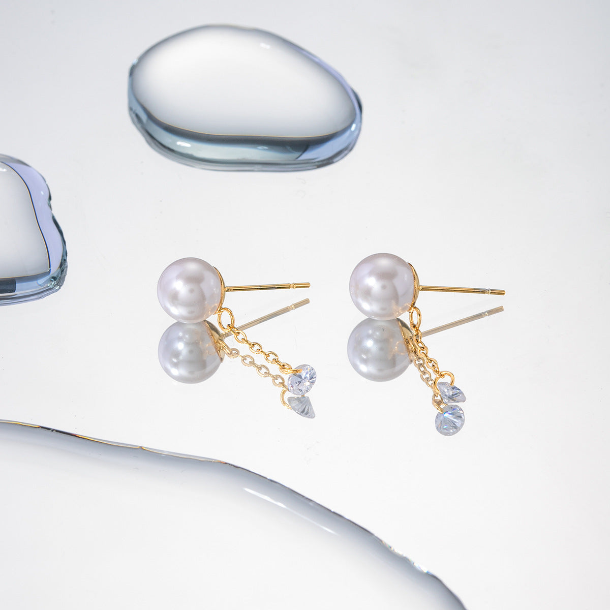 Boucles d'oreilles pendantes en zircon et perles exquises
