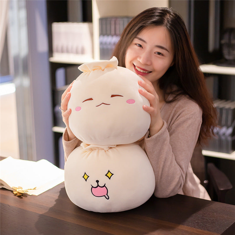 Expression douce et mignonne, un chignon en peluche, oreiller en pâte élastique