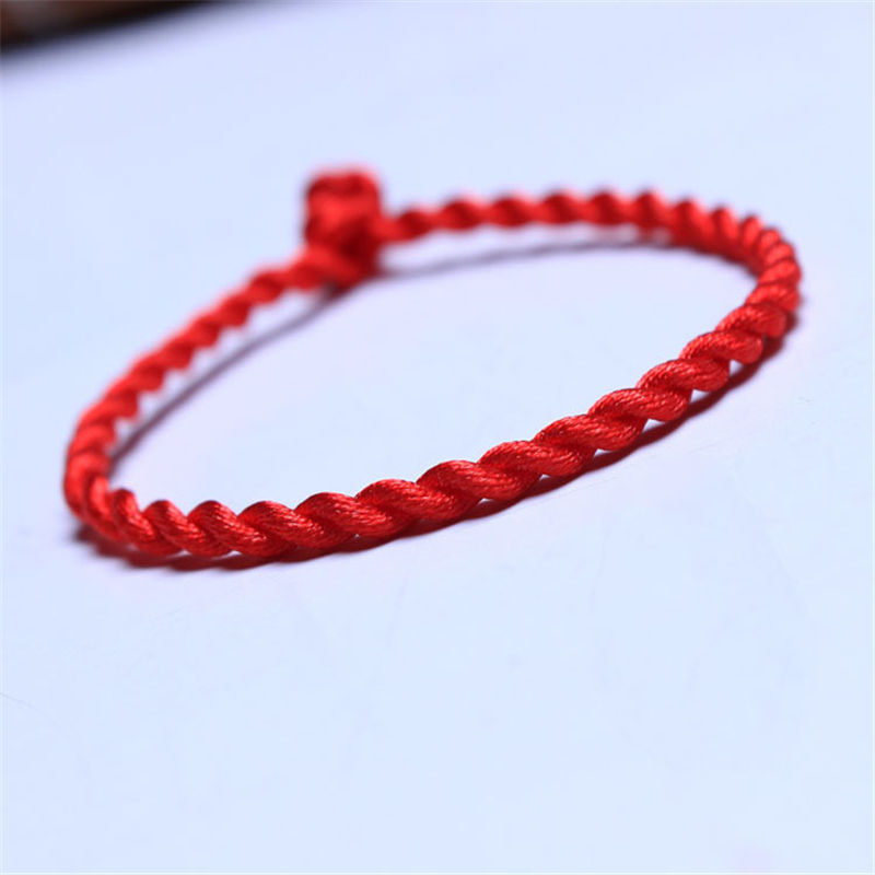Bracelet tissé à la main en corde rouge de cette année animale