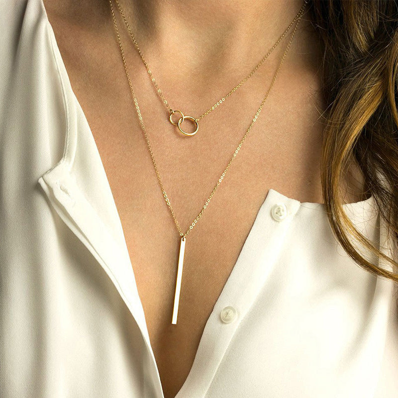 Collier en acier inoxydable à double couche avec pendentif géométrique