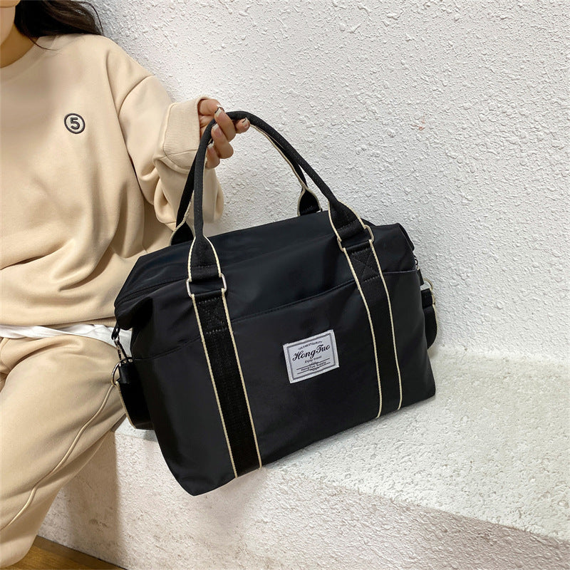 Sac de voyage Portable pour femmes, sac à bagages léger et étanche de grande capacité