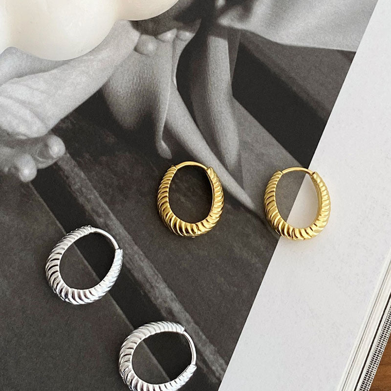 Boucles d'oreilles torsadées ondulées à ellipse géométrique simple pour femmes