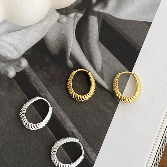 Boucles d'oreilles torsadées ondulées à ellipse géométrique simple pour femmes