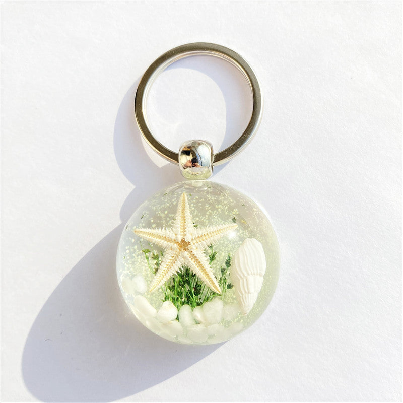 Colgante de llavero de ámbar de estrella de mar