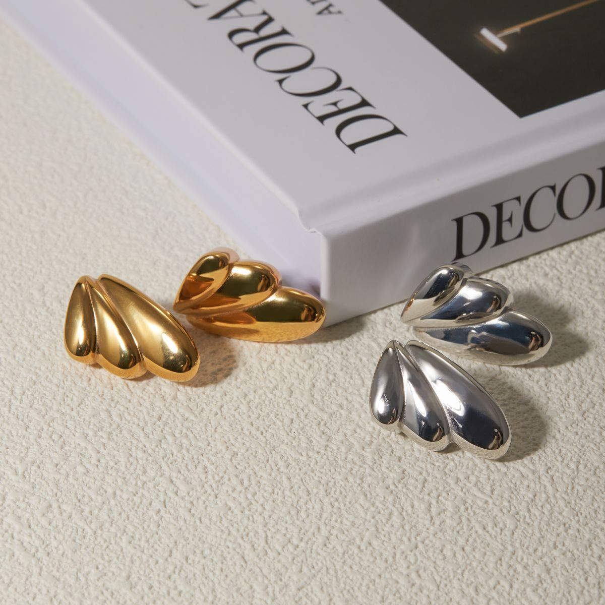 Boucles d'oreilles ailes en acier inoxydable or 18 carats Geometry