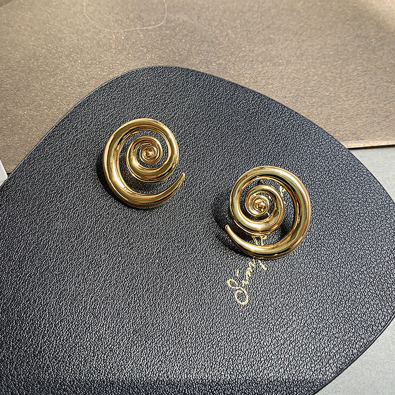 Boucles d'oreilles à rotation géométrique en or 18 carats
