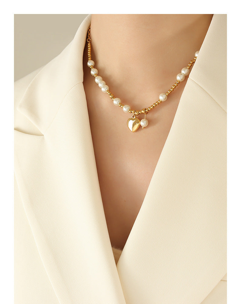 Collier pendentif coeur d'amour perle en acier titane