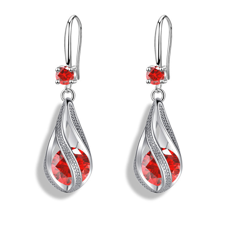 Boucles d'oreilles en forme de larme rotative pour femmes