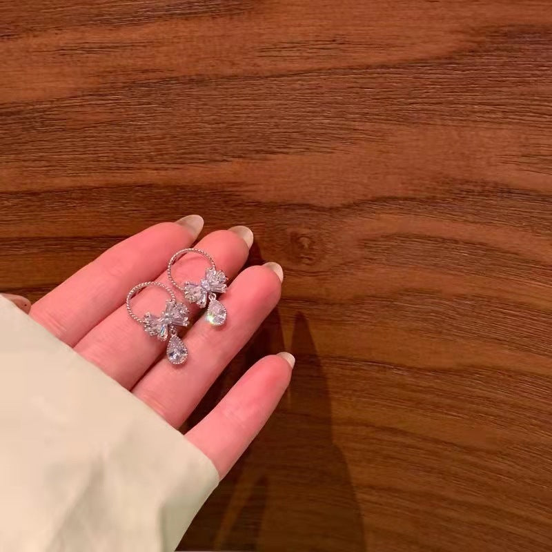 Boucles d'oreilles féminines polyvalentes et atmosphériques