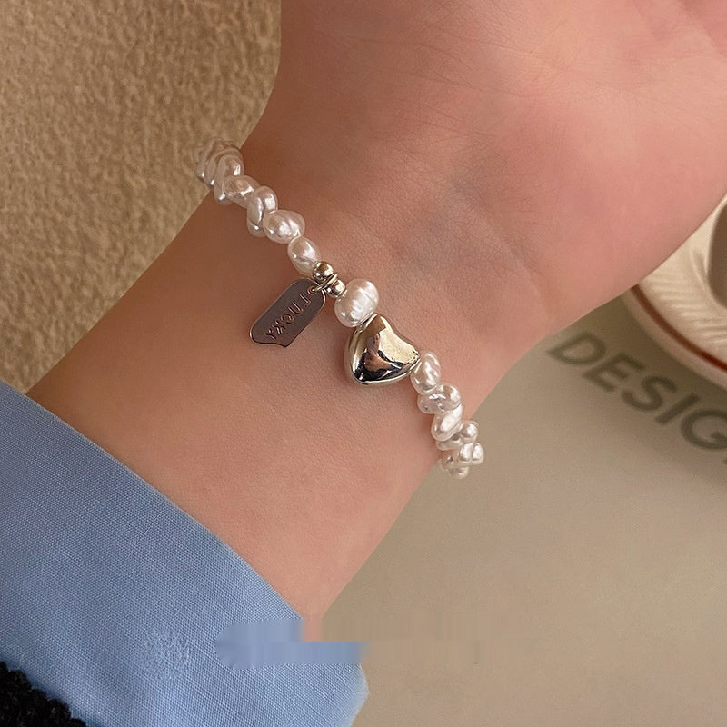 Pulsera de corazón de perlas de temperamento de moda para mujer