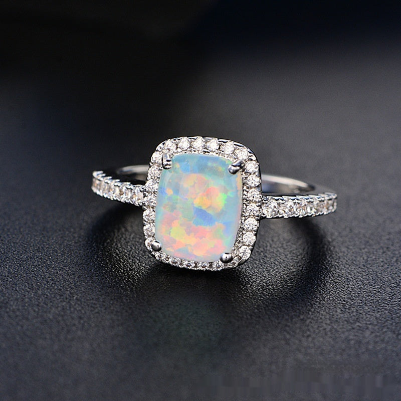 Anillo de ópalo de diamante rosa multicolor europeo y americano circonita con incrustaciones de moda Simple