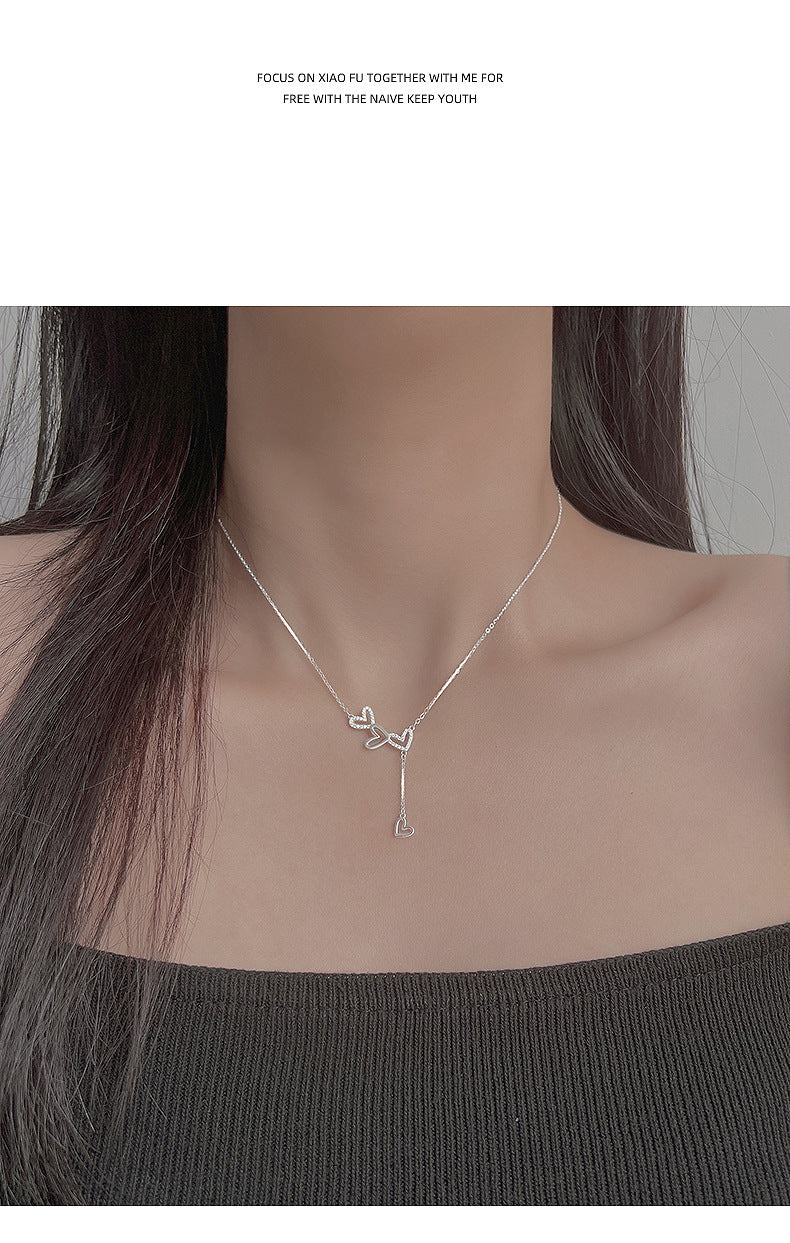 Collier de conception minoritaire de luxe léger à pampilles en forme de cœur