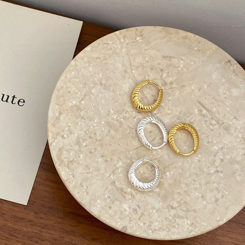 Boucles d'oreilles torsadées ondulées à ellipse géométrique simple pour femmes