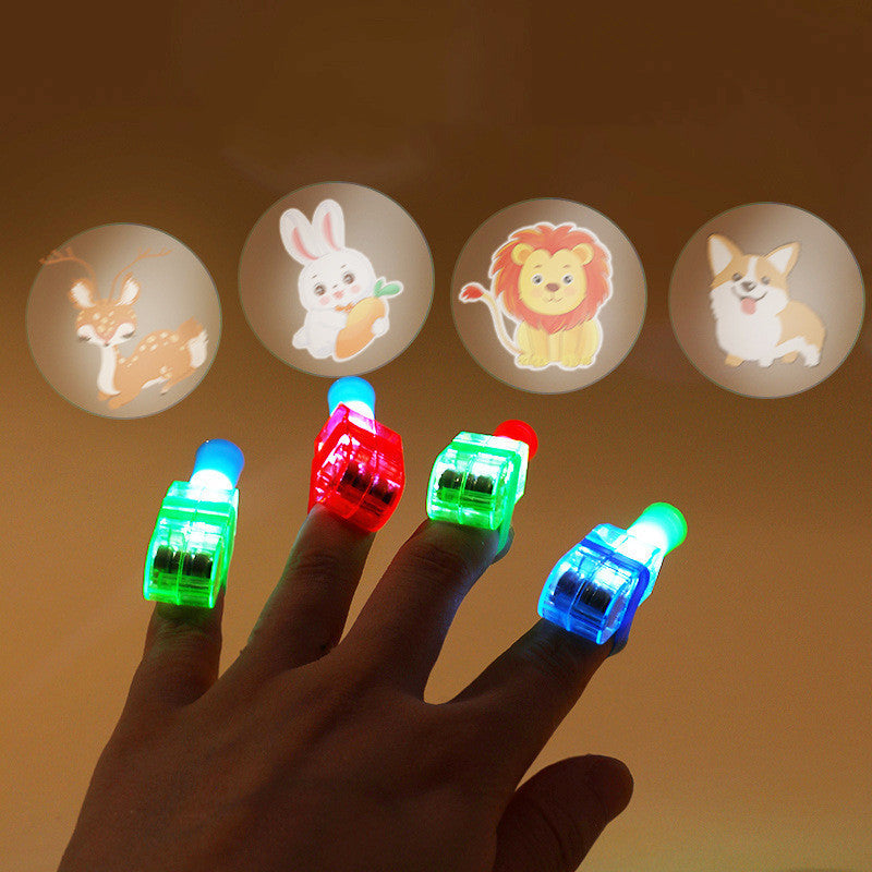 Lámpara de proyección de dedo de dibujos animados juguete luminoso