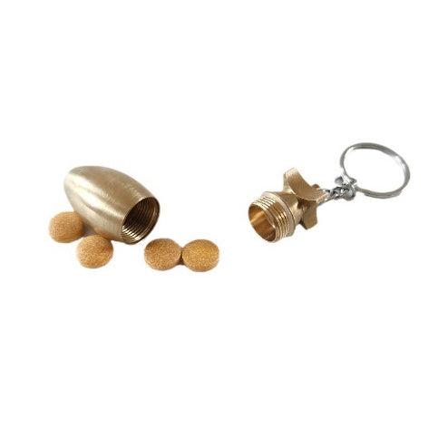 A Brass Bomb Shaped Medicine Bottle Keychain