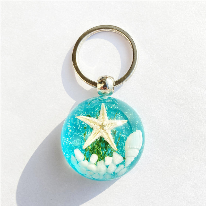 Colgante de llavero de ámbar de estrella de mar