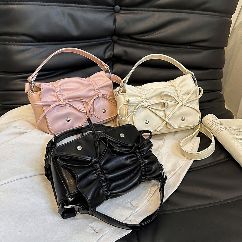 Sac à bandoulière assorti en cuir souple de style occidental