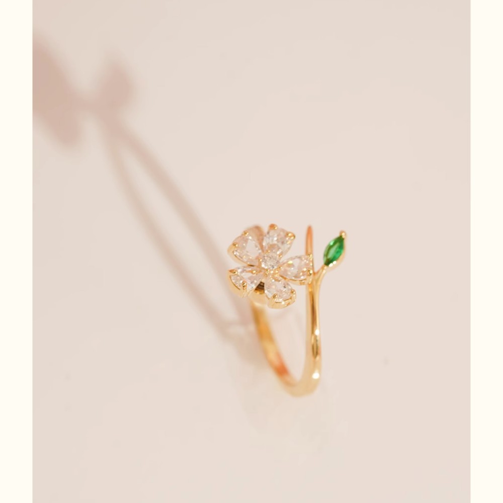 Peut faire pivoter l'anneau de fleur de cerisier en cristal
