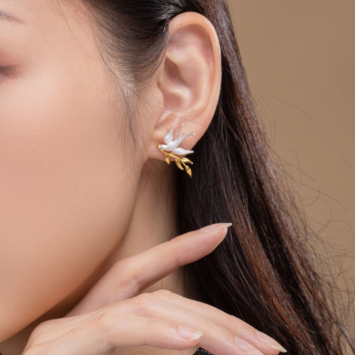 Clous d'oreilles branche d'hirondelle plaqué argent