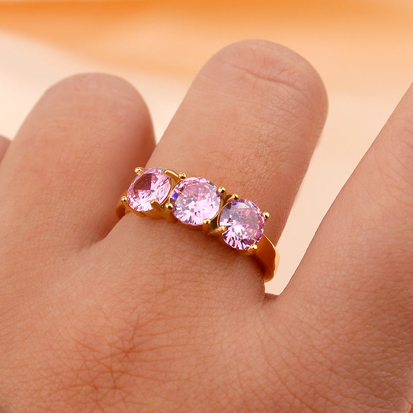 Bague ronde en acier plaqué titane et Zircon, incrustée de quatre griffes de haute qualité, à trois arrangements