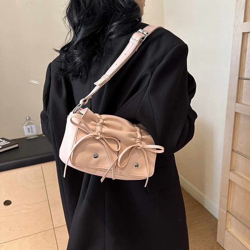 Sac à bandoulière assorti en cuir souple de style occidental