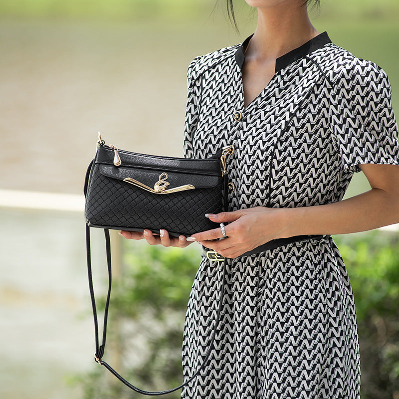 Práctico bolso bandolera con relieve Lingge