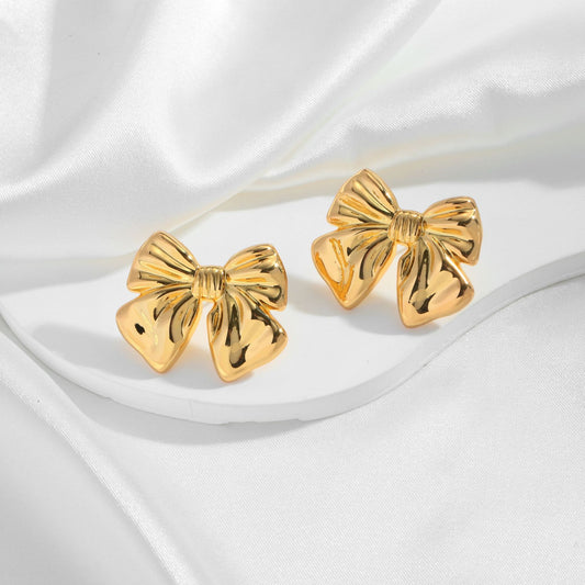 Cuivre chaud 18K de boucles d'oreilles d'arc de style européen et américain